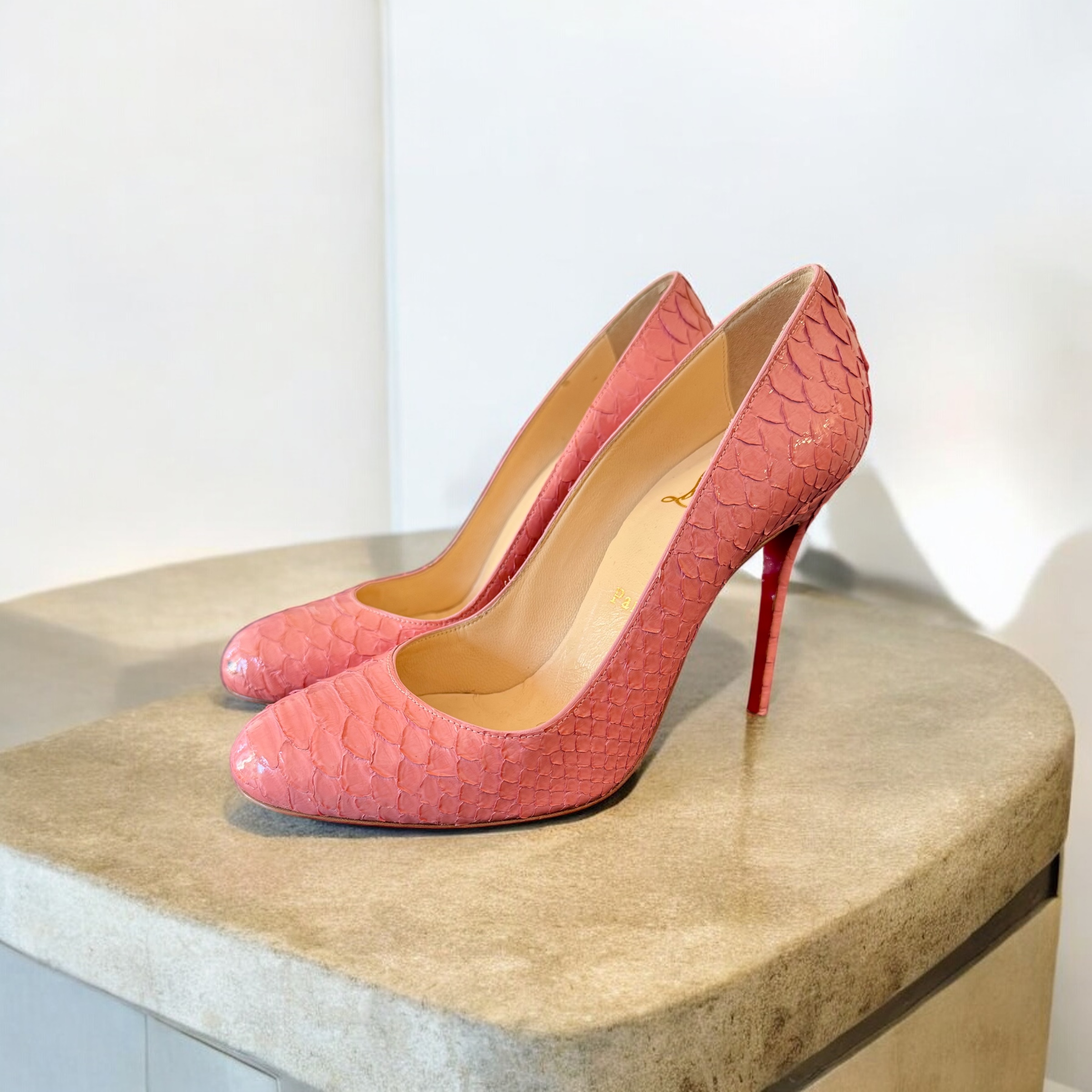 Christian Louboutin Python pumps